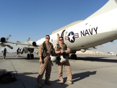 Jeremy standing in front of plane