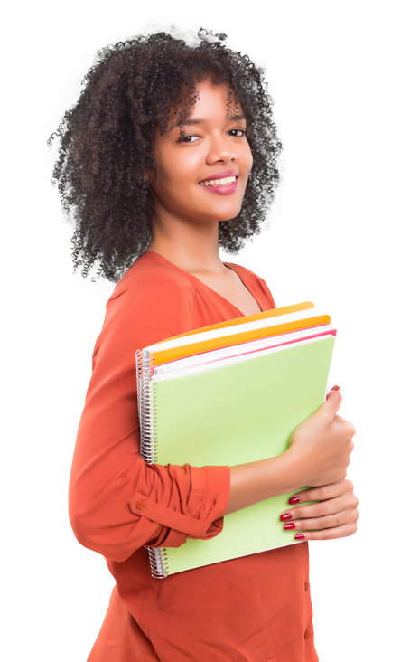 student holding three notebooks smiles at camera