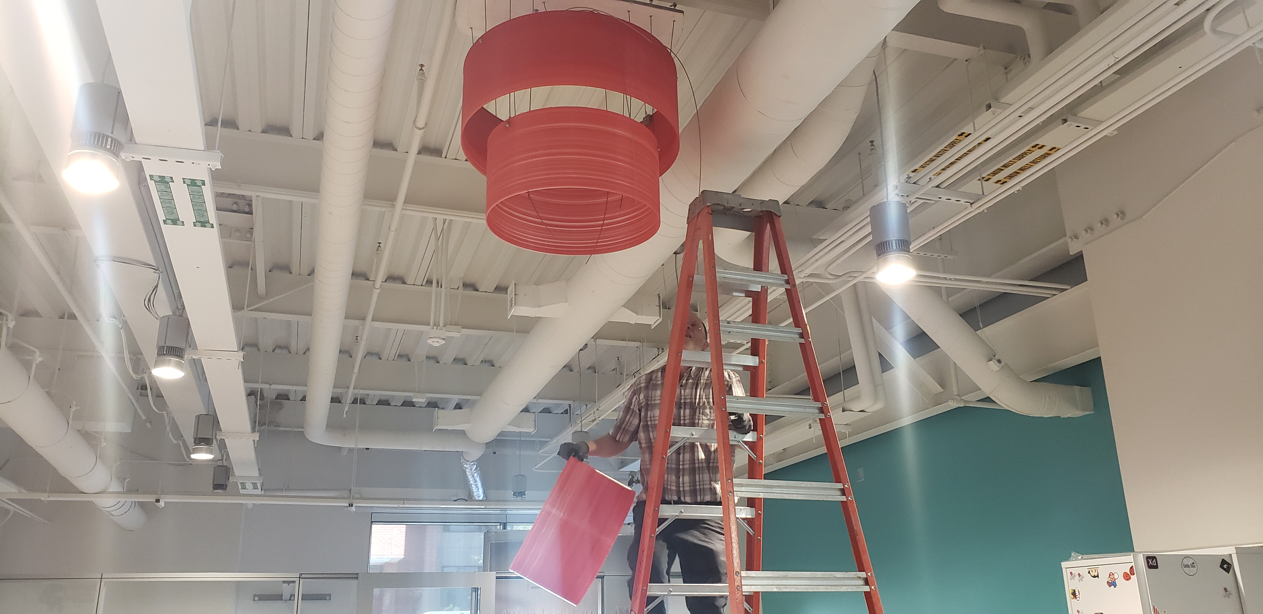 Photo: Spark rings project - light fixture representing the concussive sound of the cannon shot fired after every Cougar football touchdown.