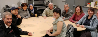 Photo: Focus groups sits at prototype table.