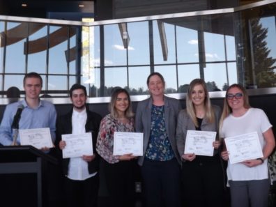Mantz Wyrick, Griffin Patrick, Isobel Luengas, Anna Deighton, Rachel Jones, & Zoe Robinson display their award certificates..
