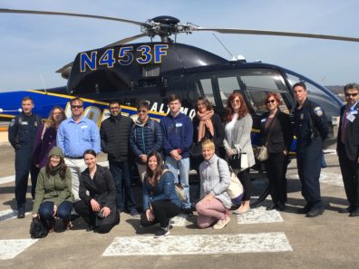 Alumni Drs. Amber Morczek and Wendy Koslicki (bottom left) at the Baltimore Police tour. Photo credit to ACJS.