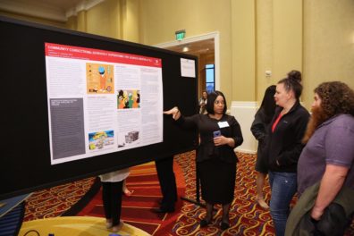 Ph.D. student, Lamonica Harrison, presenting her poster on "Community Corrections: Seriousl Supervising The Serious Mentally Ill", at ACJS.