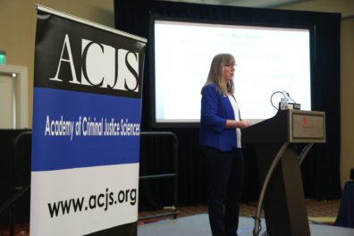ACJS President Dr. Faith Lutze, giving her presidential address at the ACJS meeting.
