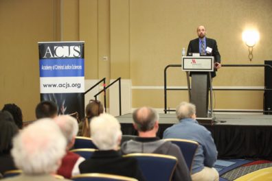 Dr. David Makin, ACJS program chair, introducing the ACJS President Dr. Faith Lutze. Photo credit to ACJS.