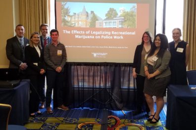 Students Jordan Sykes, Izzy Luengas, Mantz Wyrick, Griffin Patrick, Jessica Pletsch, Kaylee Philips, and Kaitlyn Van Vleet at ACJS.
