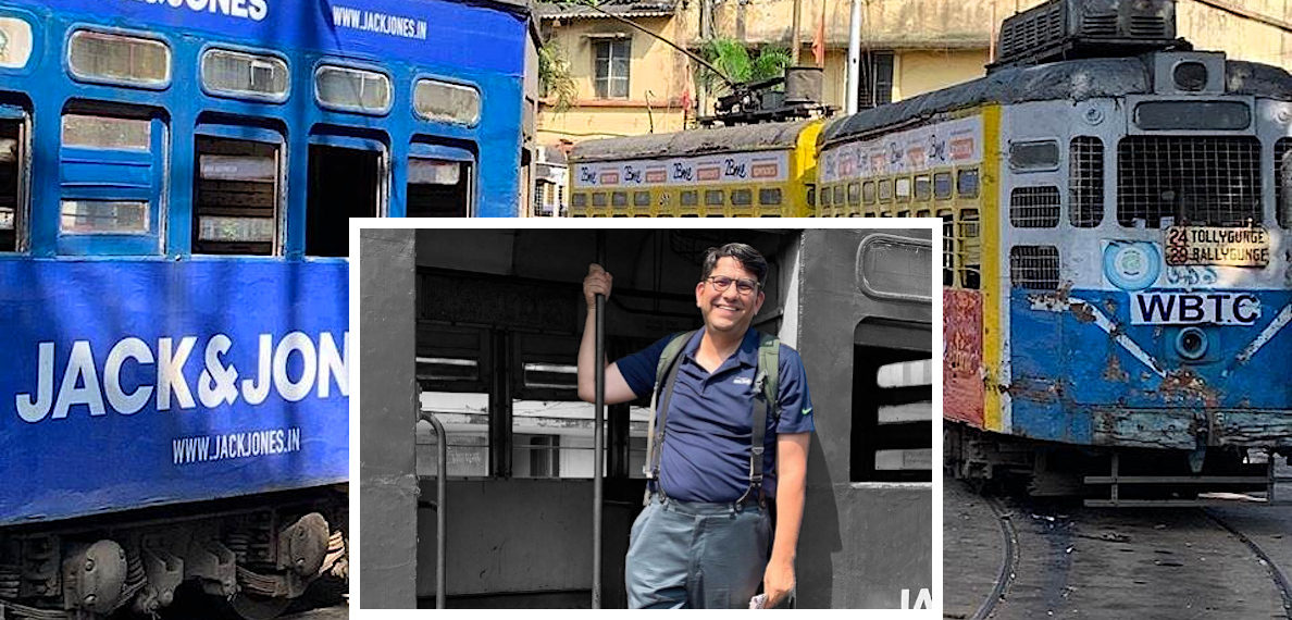 History doctoral student Ryan Booth poses at a train station in an Indian city. Booth is in India on a Fulbright studying sociocultural issues.