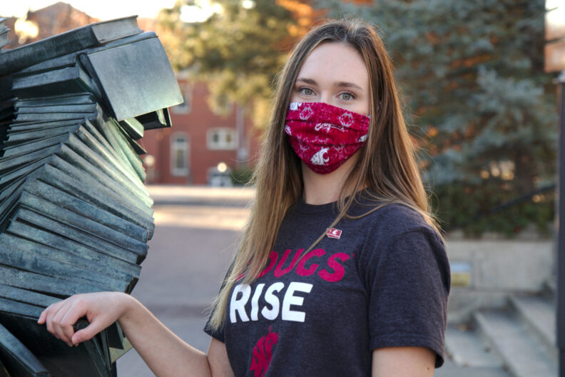 A WSU student wearing a first generation student lapel pin.
