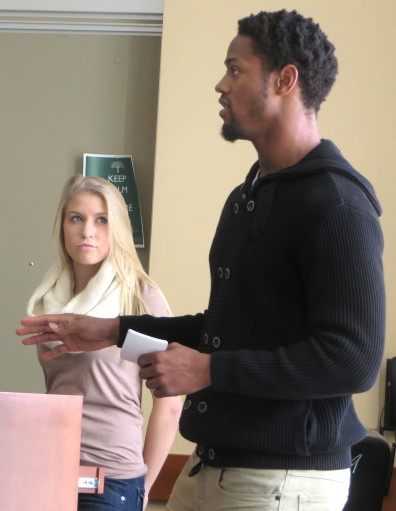 Undergraduate students Kendra Bay and Daniel Lilienthal present their research project.