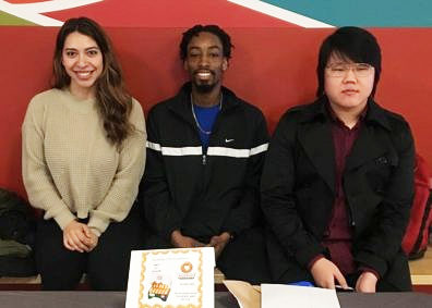 Undergraduate Sociology Club members, Briseida Soberanes, Jorden Calloway, and Julius Kim, fundraising on campus.