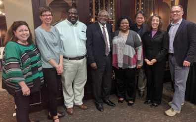 Several WSU faculty and staff members stand with Robert Bullard for a photo.