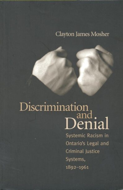The cover of the book is dark, contrasted by two balled up fists.