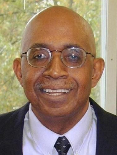 A front facing photo of Franklin Wilson. He is looking into the camera and smiling.