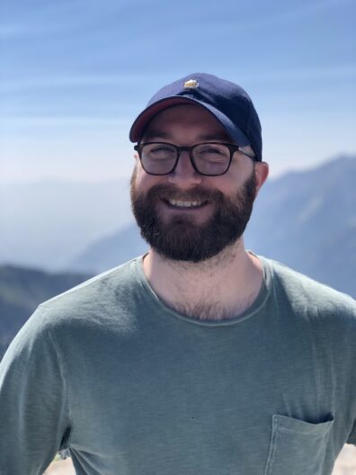 Jesse is forward facing and smiling.