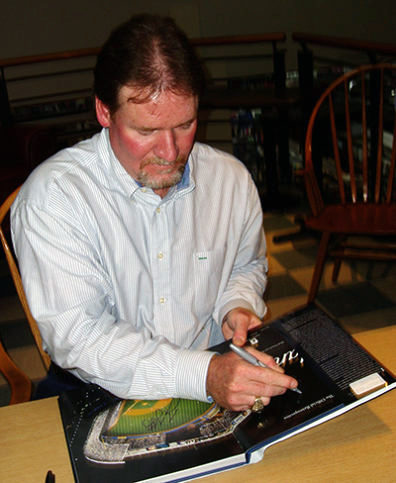 ampa Bay Devil Ray Wade Boggs autographing the book “Yankee Stadium” at a book signing on September 23, 2008. Photo courtesy of Wikimedia Commons.