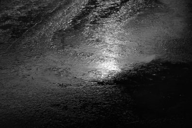 Ice sits on a roadway