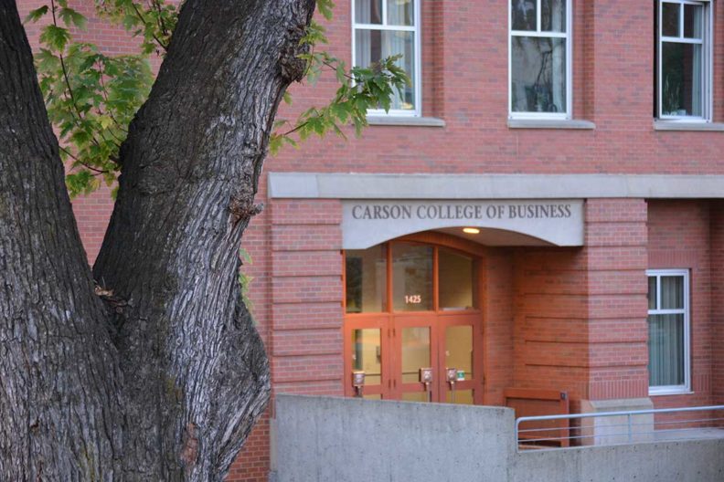 Front entrance of Todd Hall with Carson College of Business above the door.