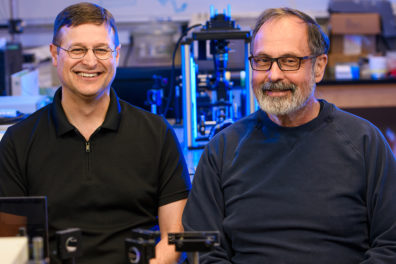 Brozik and Hipps (l-r), WSU chemistry scientists, seek to develop molecular machines that self-replicate materials. Photo by Robert Hubner, WSU Photo Services.