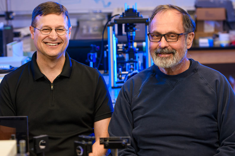 Brozik and Hipps (l-r), WSU chemistry scientists, seek to develop molecular machines that self-replicate materials. Photo by Robert Hubner, WSU Photo Services.