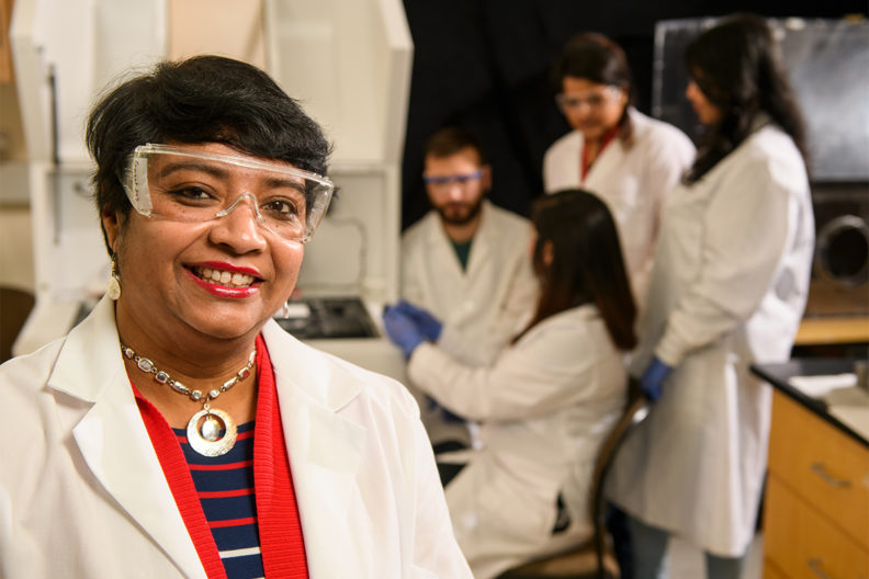 Susmita Bose standing in a laboratory