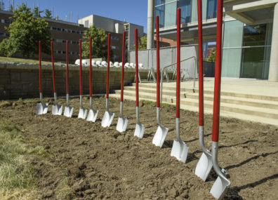 Ceremonial shovels wedged into dirt