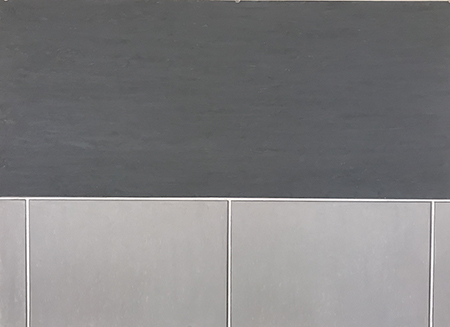 Rectangular tiles in dark and light grey.