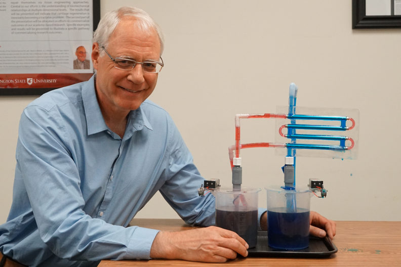 man by scientific teaching device