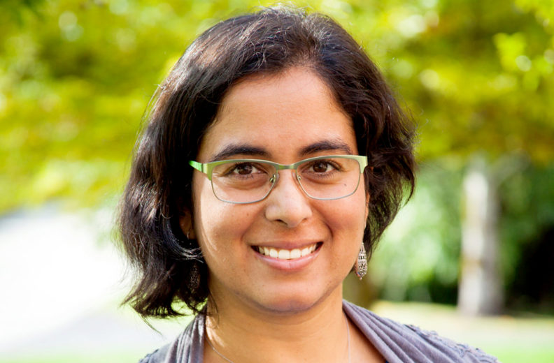Closeup of Deepti Singh outdoors.