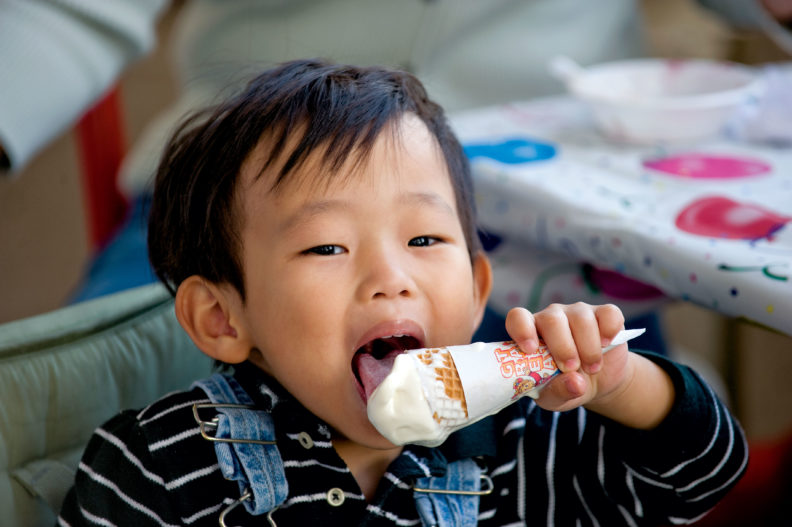 Young kid eating ice-cream at Ferdinand's.