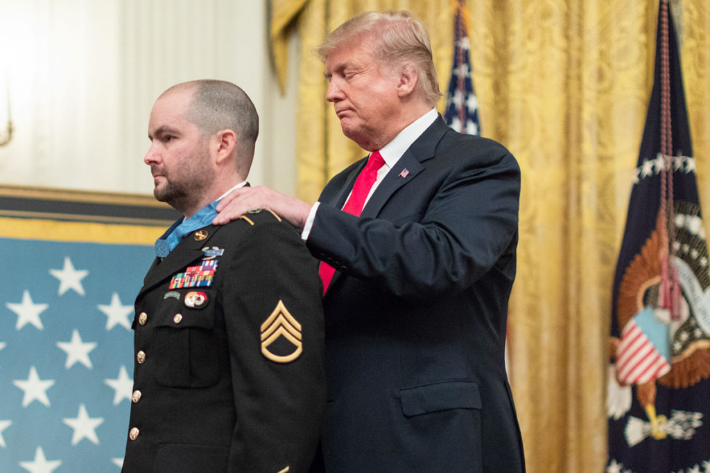President Donald Trump decorates Shurer with the Medal of Honor.