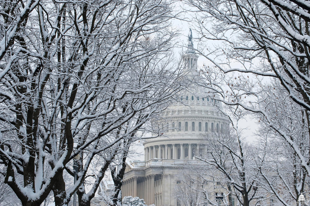 state capitol building with snow cover