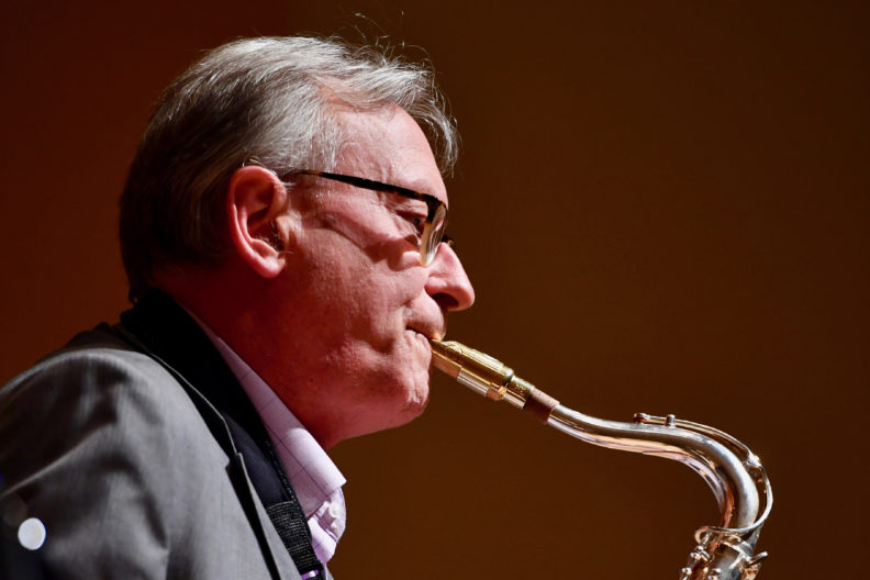 Closeup of Yasinitsky playing saxophone.