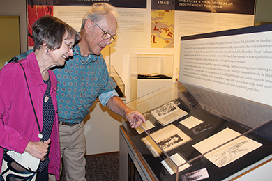 WSU professor emerita of English Diane Gillespie and husband Dick Domey look over books in the Hogarth Press book collection in Manuscripts, Archives and Special Collections.