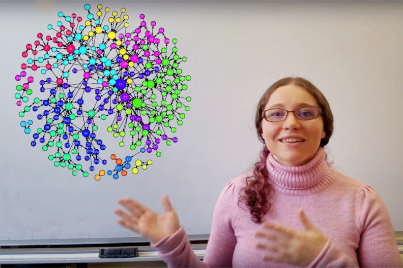 Closeup of Catanese next to a network model.