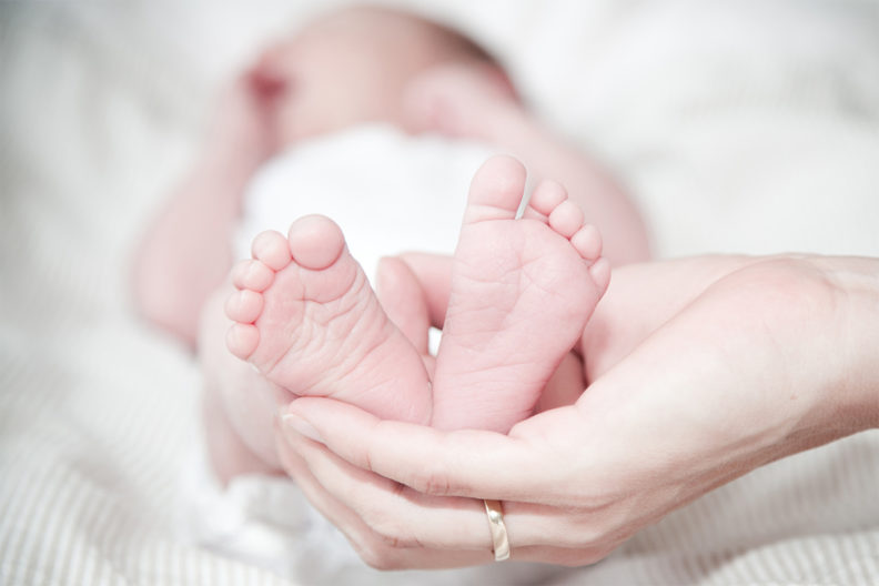 A closeup of baby feet.
