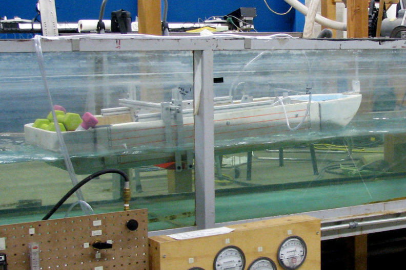 Experimental boat in a water channel in laboratory.