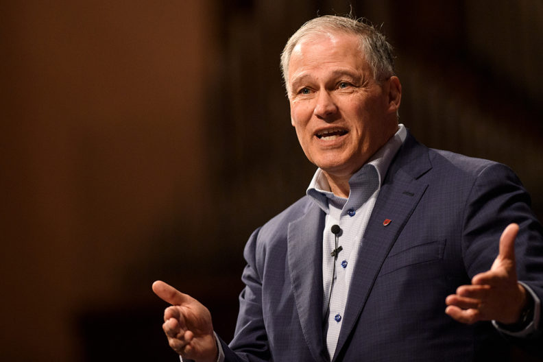 Washington Governor Jay Inslee on stage at the WSU Pullman campus.