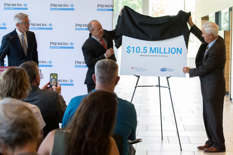 Premera reveals sign announcing $10.5 million gift to support rural health care.