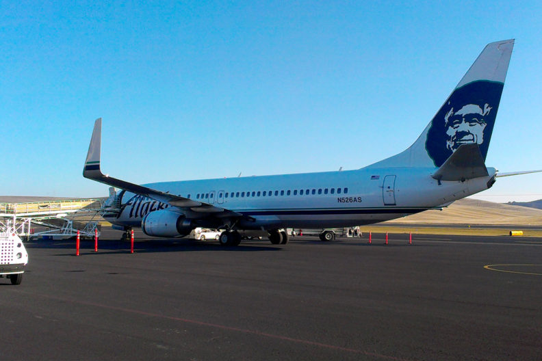 Alaska Airlines plane parked on Tarmac at Pullman-Moscow Regional Airport.
