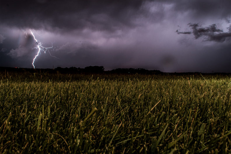 Lightning over an agricultural field.