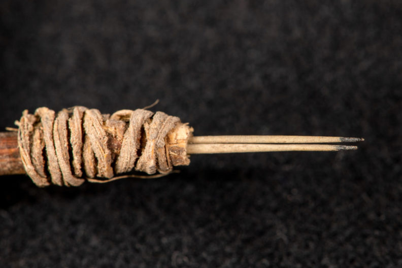 A closeup of a old tattoo tool
