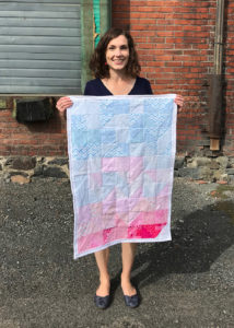 Lisa Waananen Jones holding a baby blanket