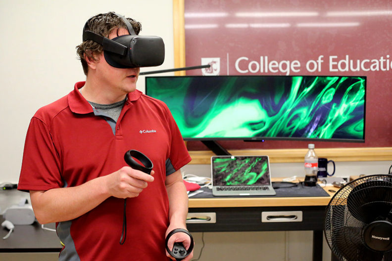 Don McMahon wearing a virtual reality headset.