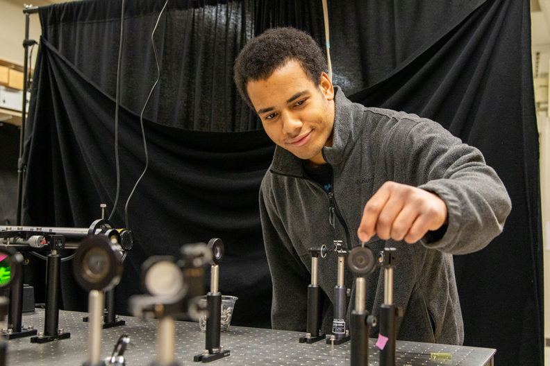 WSU junior Jamil Fields works in a laboratory.