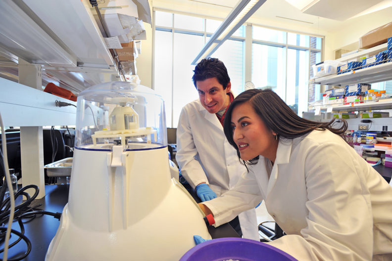 Alan Goodman and Marena Guzman in the lab.
