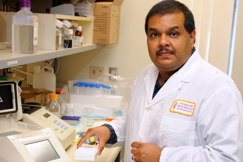 Closeup of Santanu Bose in a laboratory.
