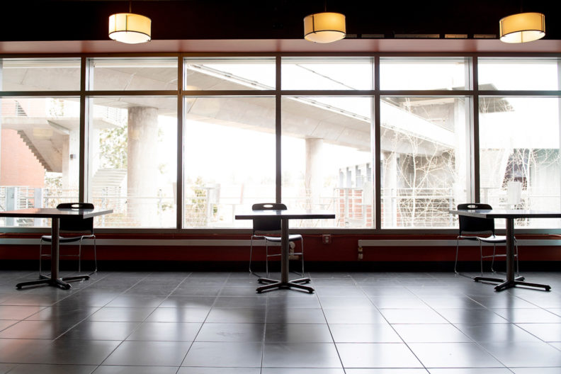 Tables and chairs set far apart inside the CUB at WSU Pullman.