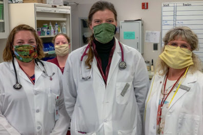 Members of the WSU Veterinary Teaching Hospital wearing cloth face masks.