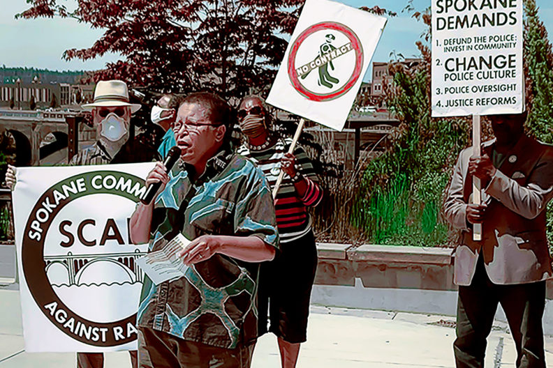 Sandy Williams speaking during an organized protest in Spokane.