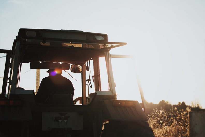 A man drives a tractor